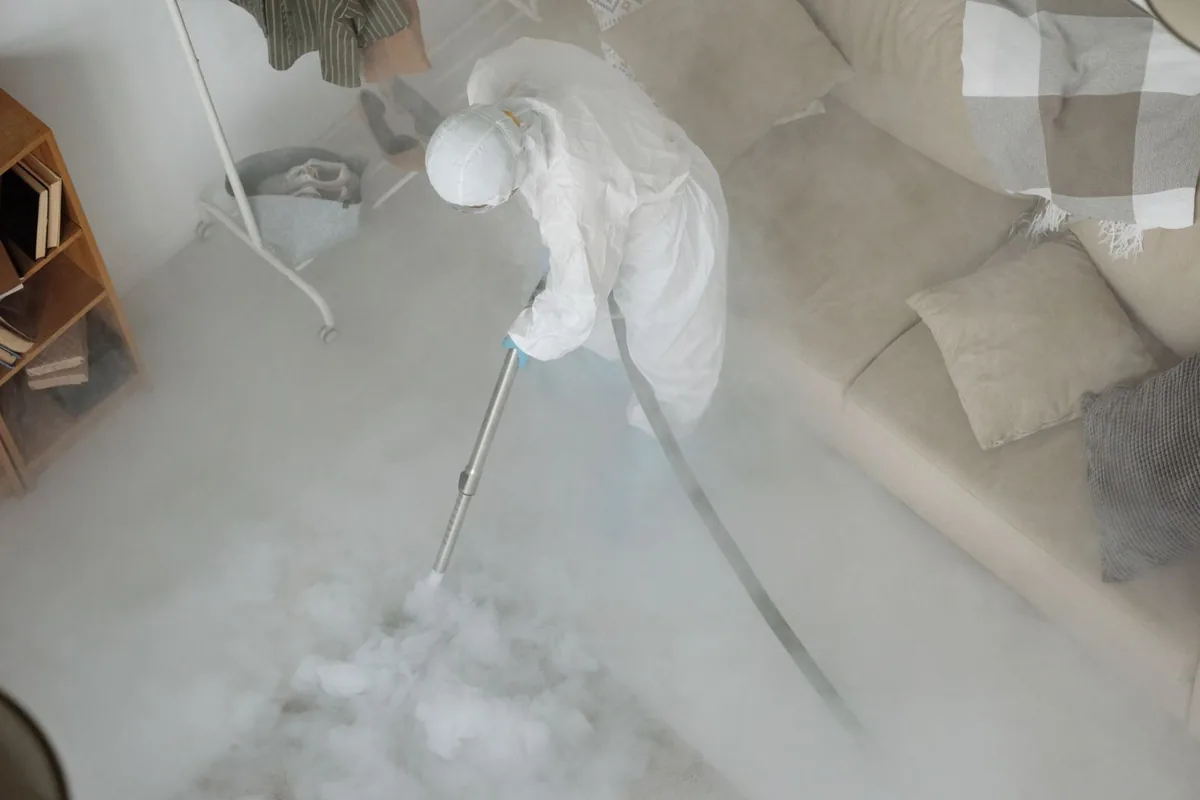 Biohazard cleanup technician in protective equipment, Richmond Hill, GA